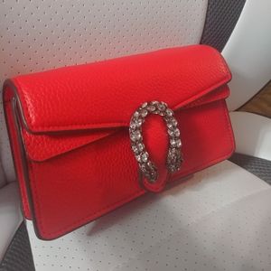 Genuine leather mini bag.